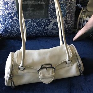 Pale white Cole Haan leather purse.